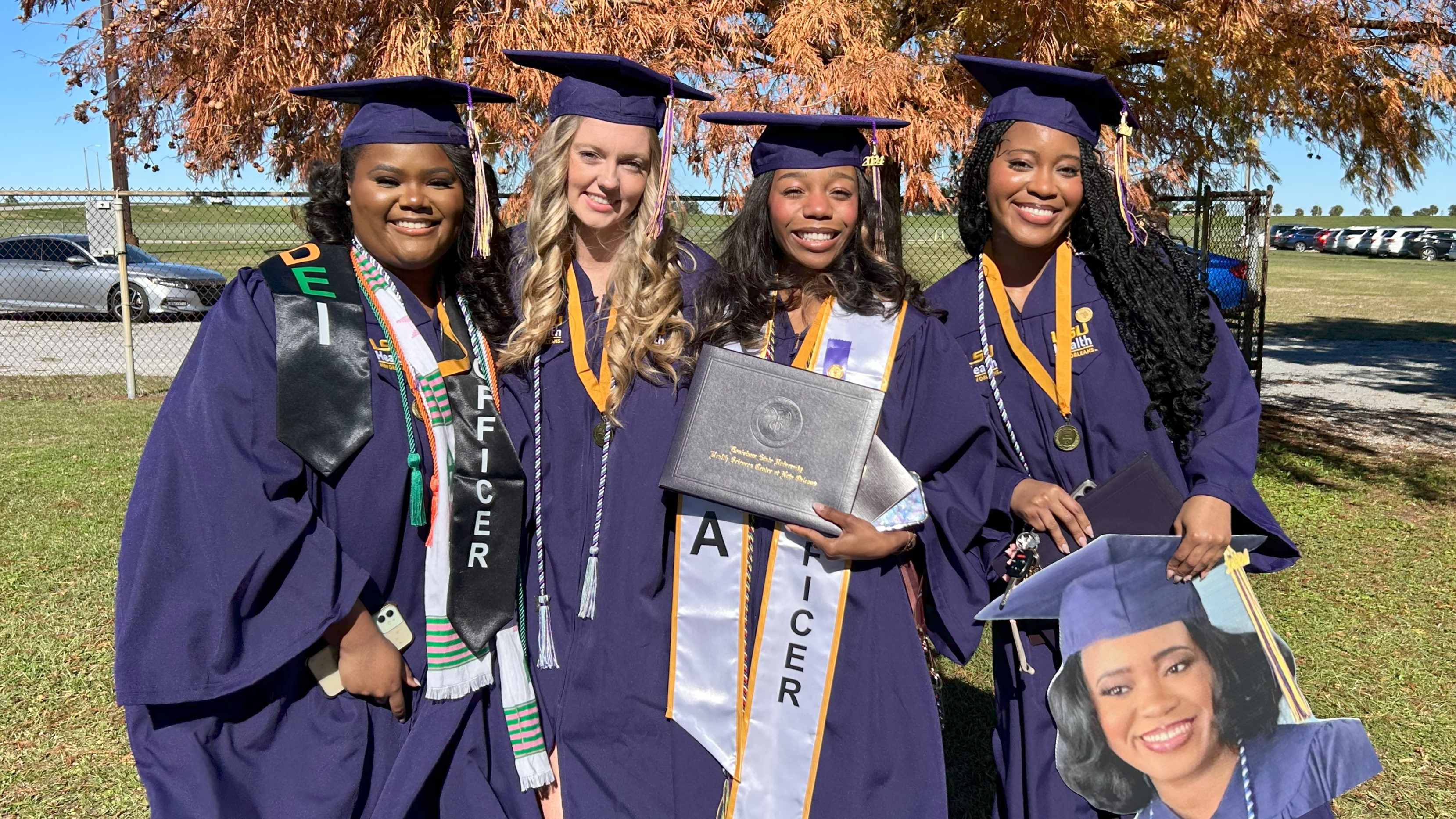 four School of Nursing graduates